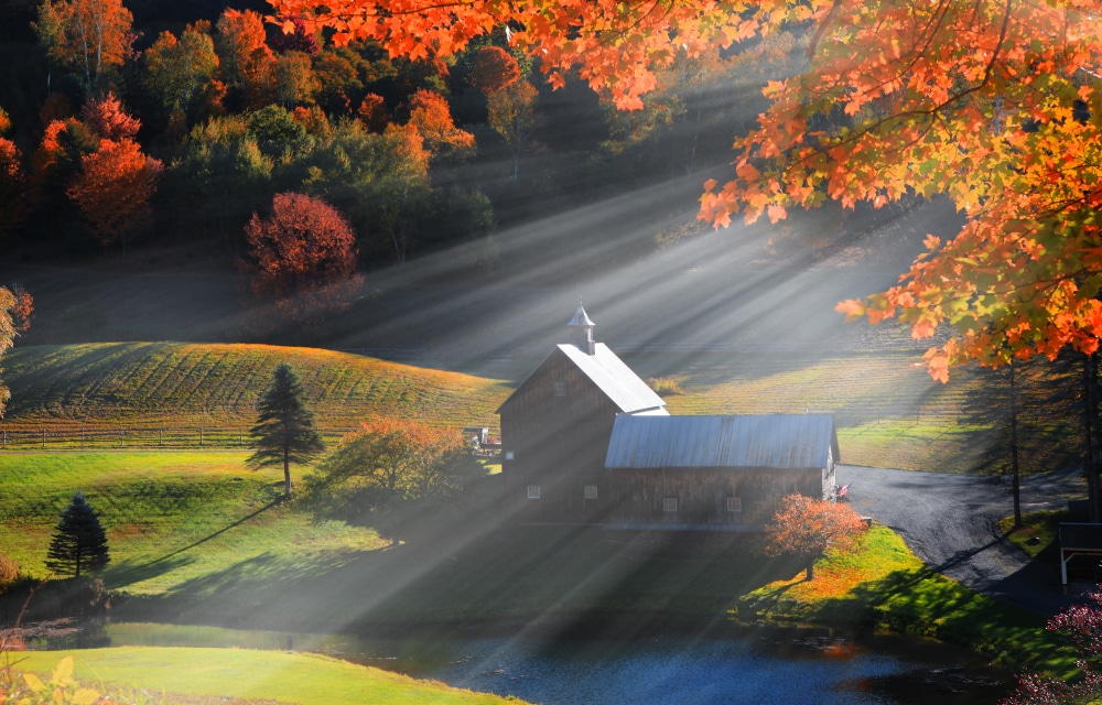 A beautiful old barn with fall foliage - a picture of the best of Vermont in the fall