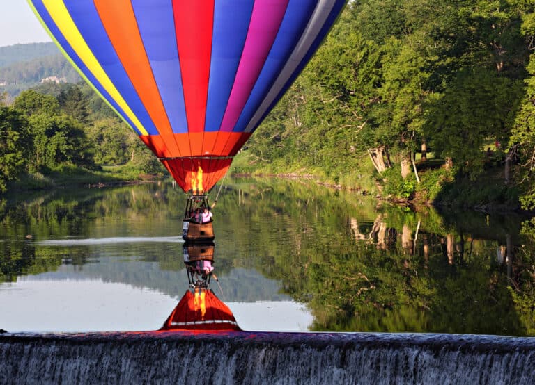 A balloon on the flat waters at the Quechee Balloon Festival in Vermont